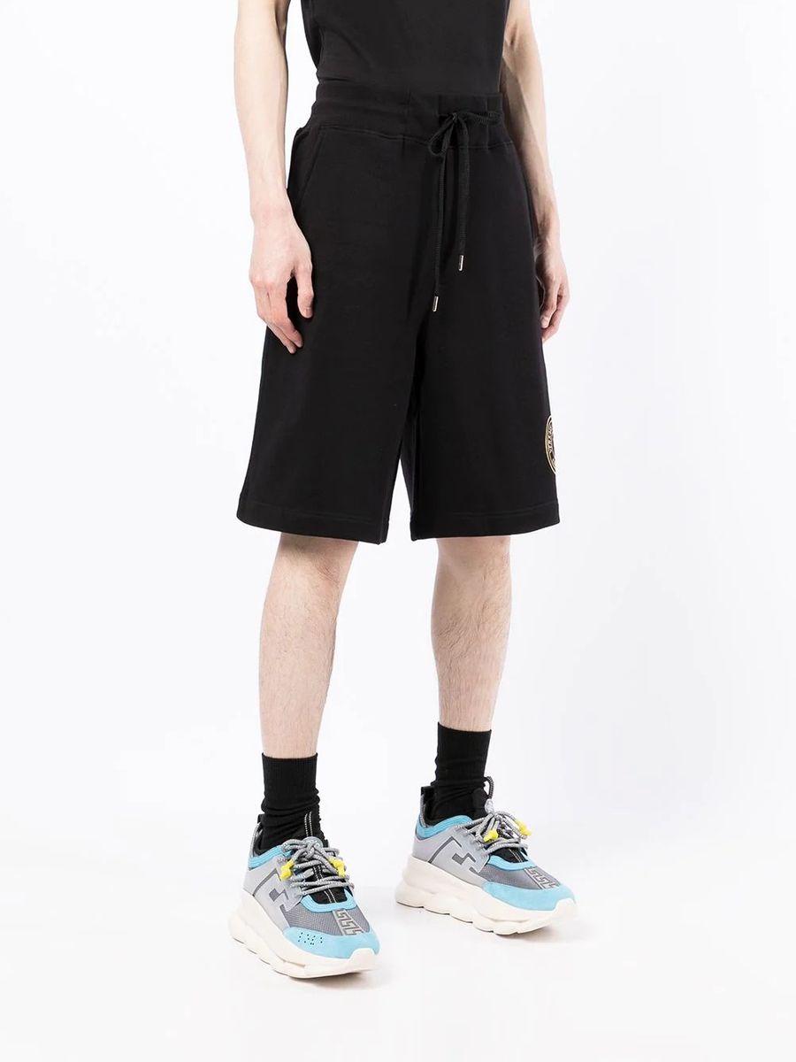 Pantaloncini Versace Jeans Couture con logo stampato Nero | Caposerio